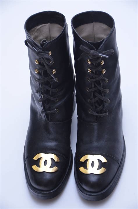 vintage chanel black and white booties|Chanel denim combat boots.